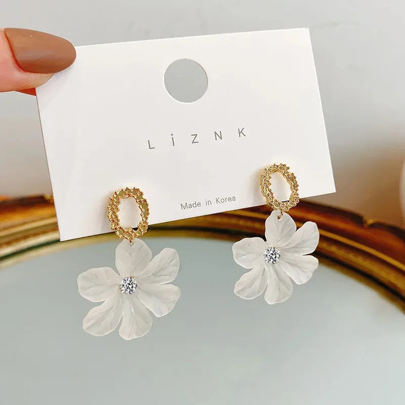 Translucent White Flower Hanging Earrings for Women.