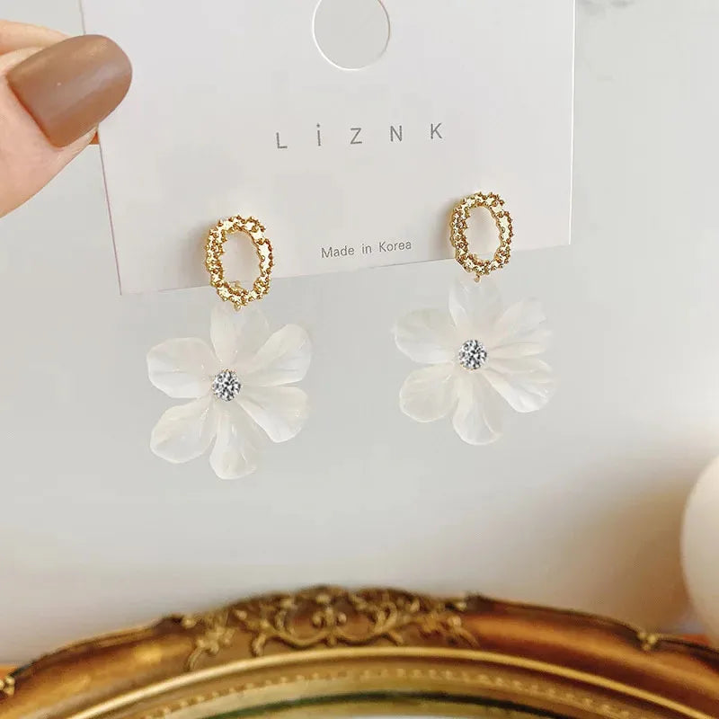 Translucent White Flower Hanging Earrings for Women.