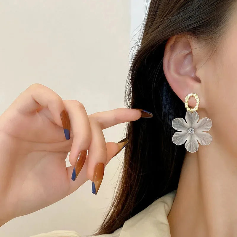 Translucent White Flower Hanging Earrings for Women.