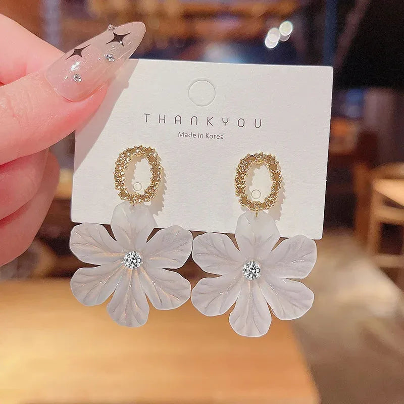 Translucent White Flower Hanging Earrings for Women.
