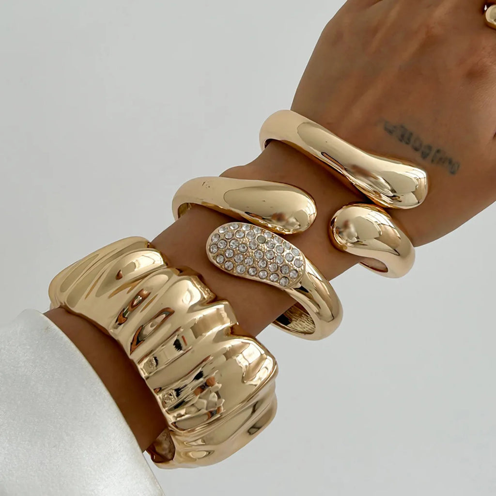 Ingemark Hip Hop Inlaid Rhinestones Water Drop Spring Bangle for Women